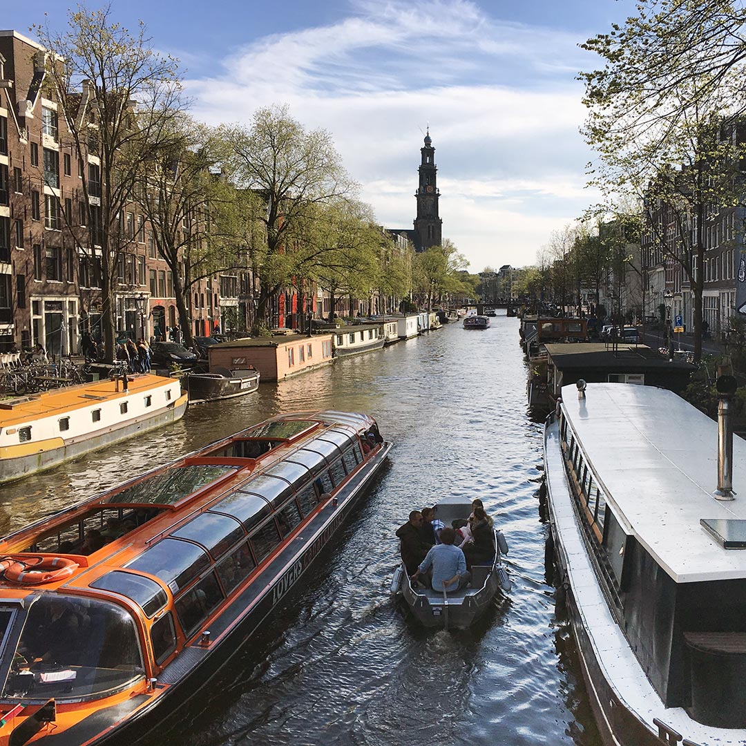 Cruise the winding canals of Amsterdam. Photo © Anna Gallagher.