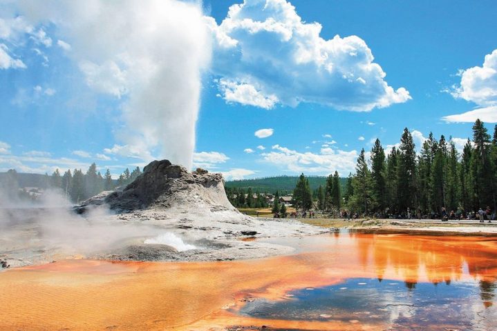 steam shooting into the air from a geyser