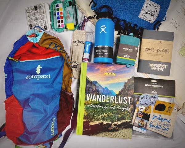 backpack and miscellaneous travel gear on display